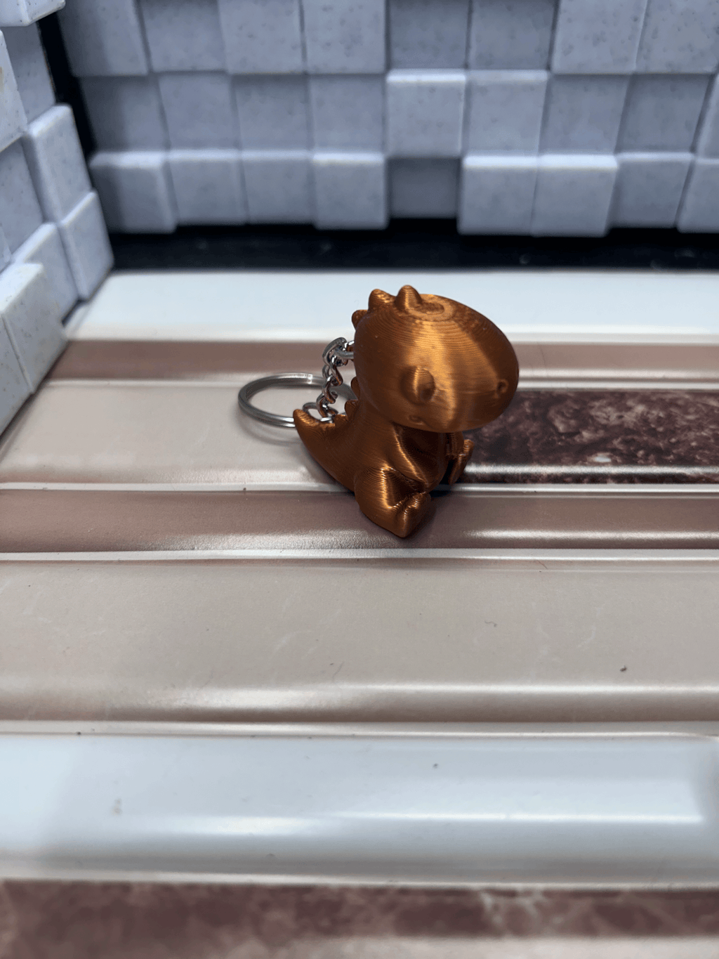 Gold Dinosaur Keychain